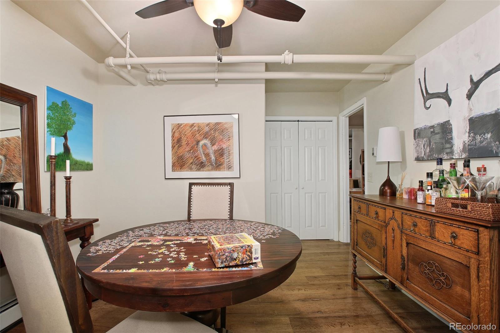 570 Gilpin Street Denver, CO 80218 - Photo 25 of 30 a view of a dining room with furniture
