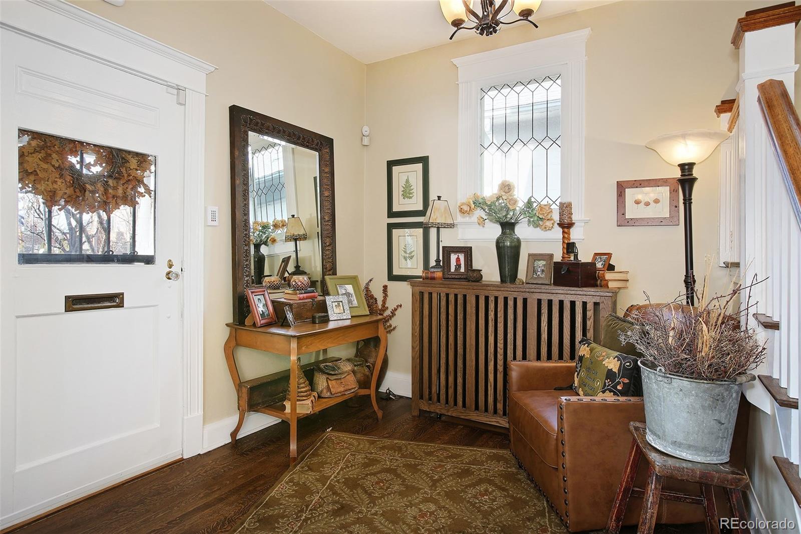 570 Gilpin Street Denver, CO 80218 - Photo 4 of 30 a living room with furniture and wooden floor