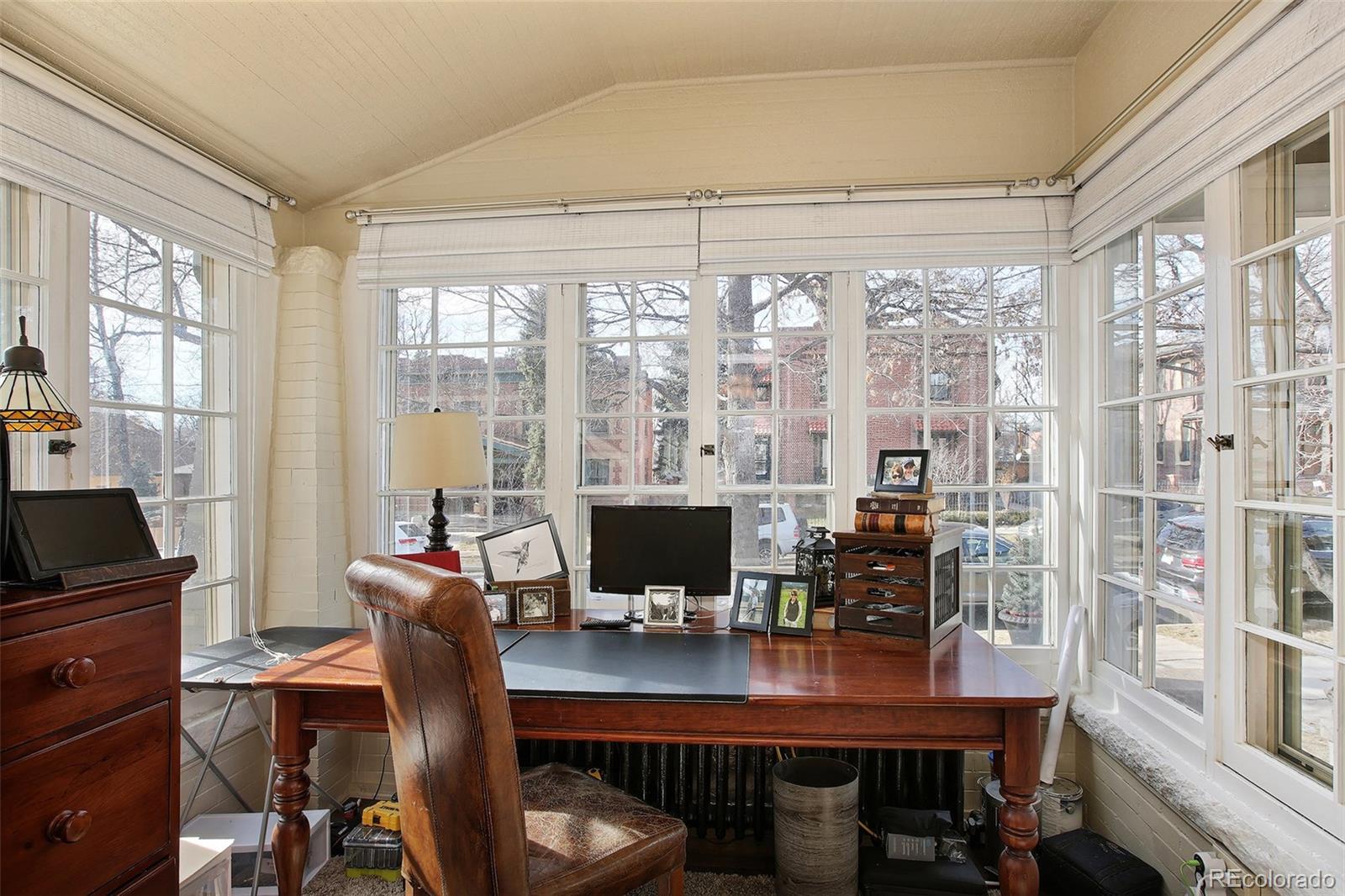 570 Gilpin Street Denver, CO 80218 - Photo 8 of 30 a view of a dining room with furniture window and outside view