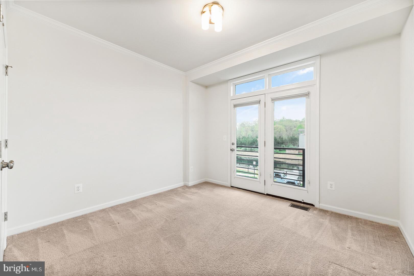 1320 Ribbon Limestone Terrace Southeast Leesburg, VA 20175 - Photo 19 of 30 Third bedroom with a private balcony