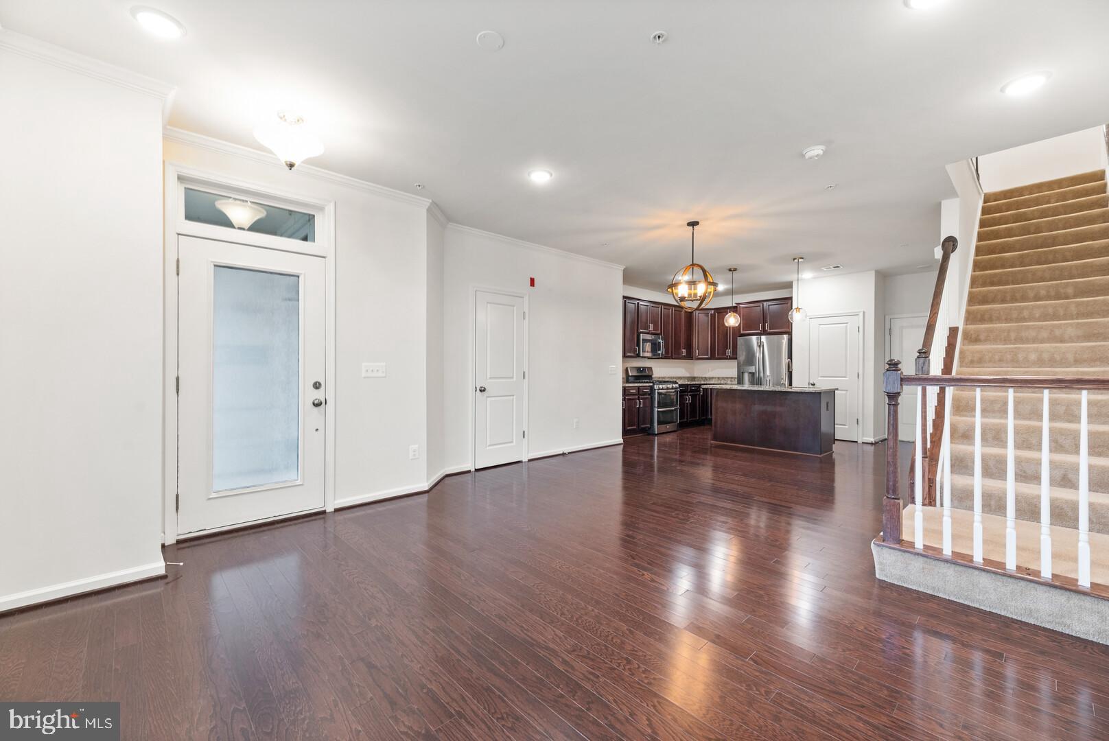 1320 Ribbon Limestone Terrace Southeast Leesburg, VA 20175 - Photo 5 of 30 Front door leads to spacious living area