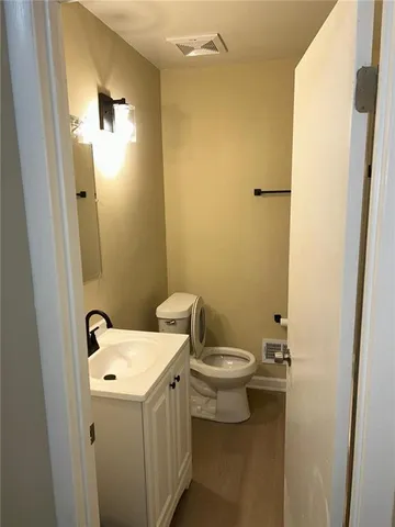 a bathroom with a sink and toilet