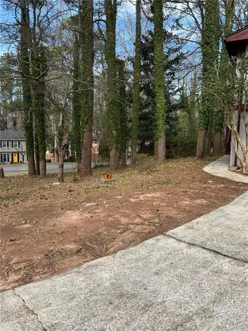 a fire hydrant in the middle of a yard