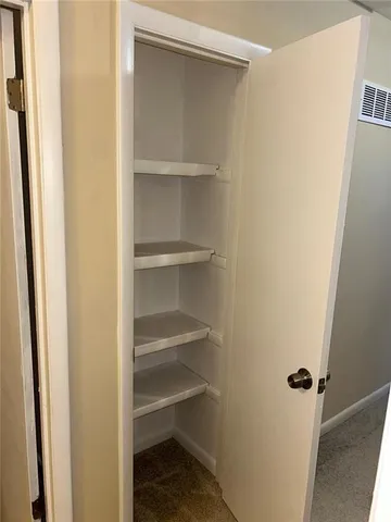 a view of a walk in closet