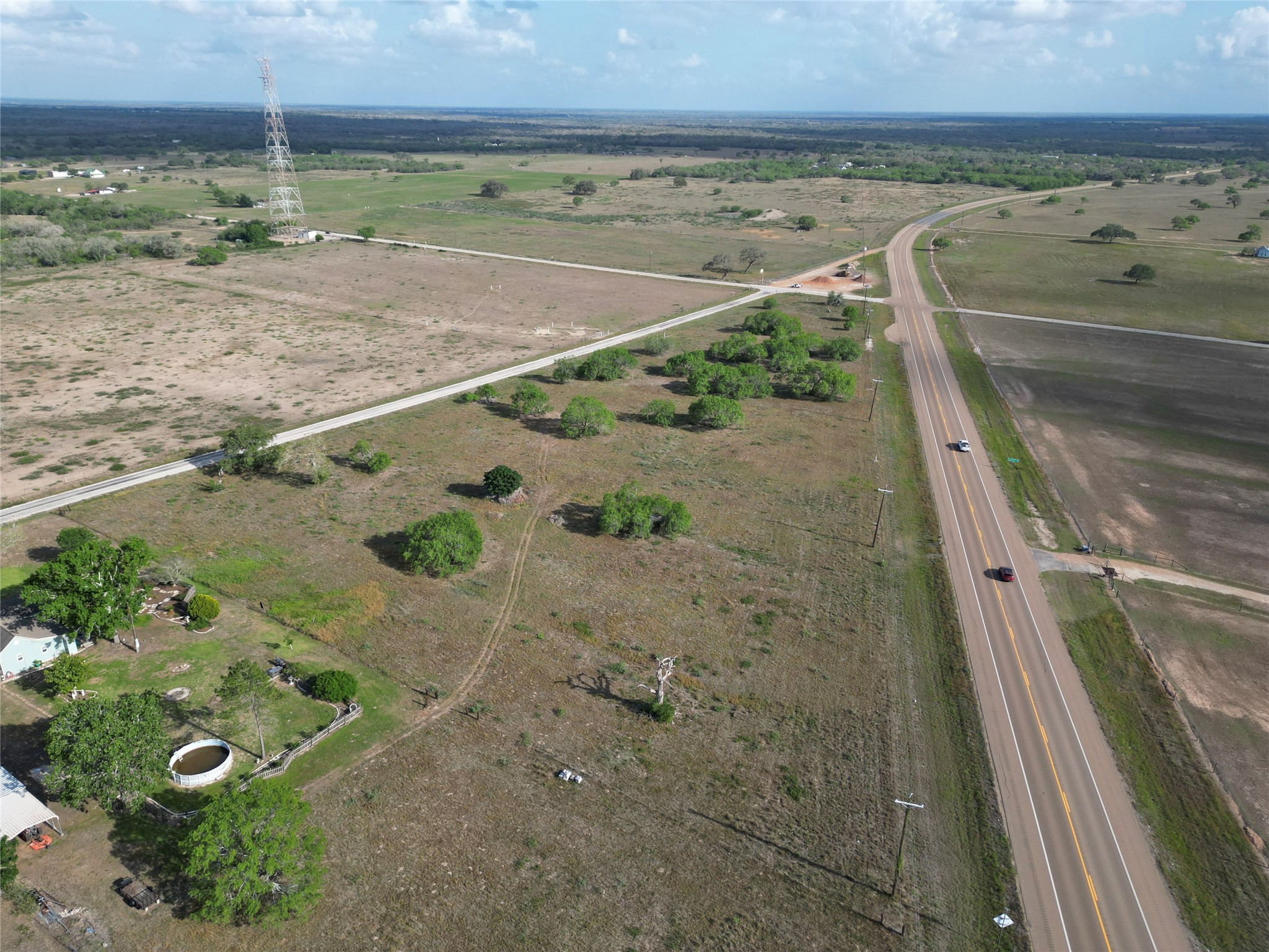 1932 Old Goliad Road Cuero, TX 77954 - Photo 25 of 25 an aerial view of a residential houses with outdoor space