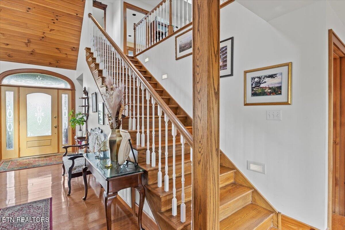 802 Stonegate Way Townsend, TN 37882 - Photo 25 of 44 a view of entryway with wooden floor and stairs