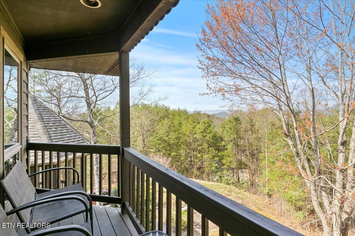 802 Stonegate Way Townsend, TN 37882 - Photo 33 of 44 a view of a balcony with wooden floor