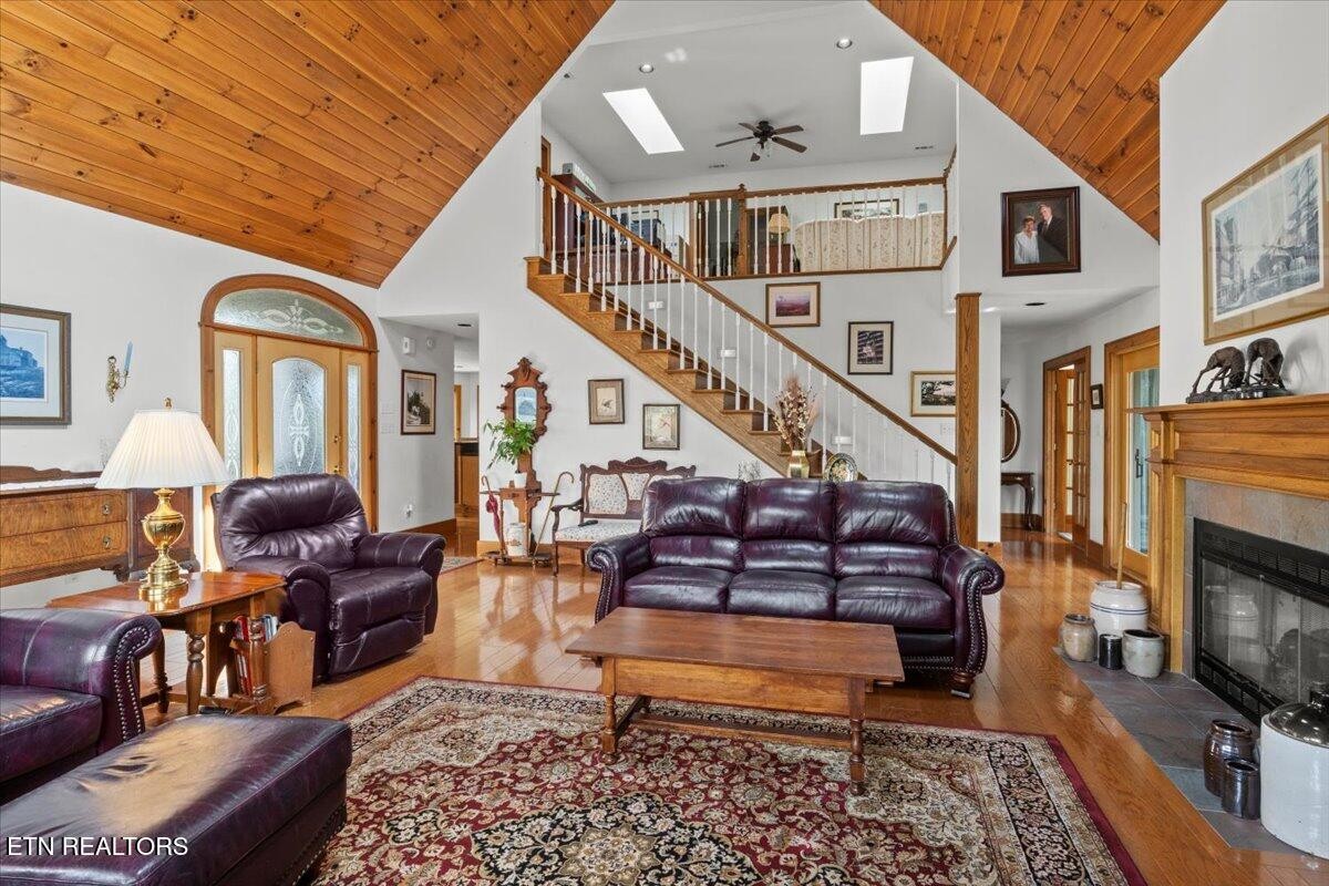 802 Stonegate Way Townsend, TN 37882 - Photo 8 of 44 a living room with furniture fireplace and rug