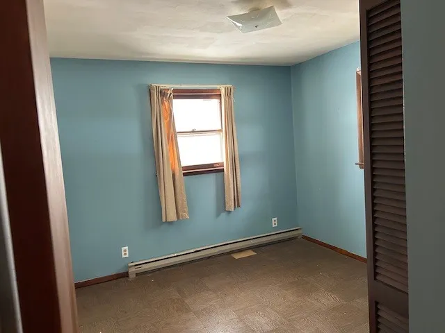 an empty room with windows