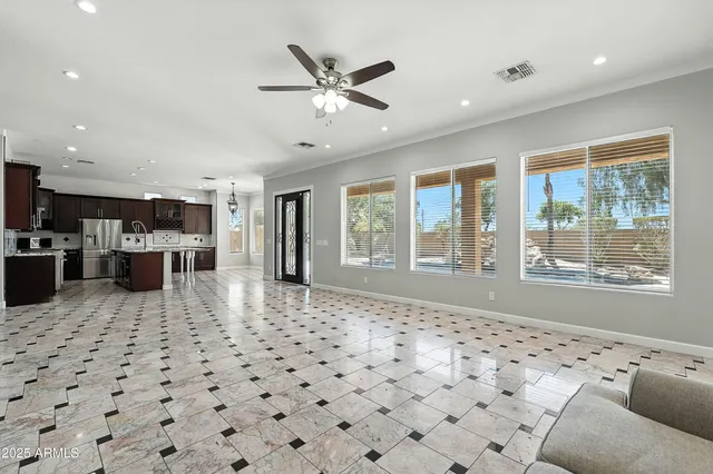 a view of a hallway with a black white checkered floor