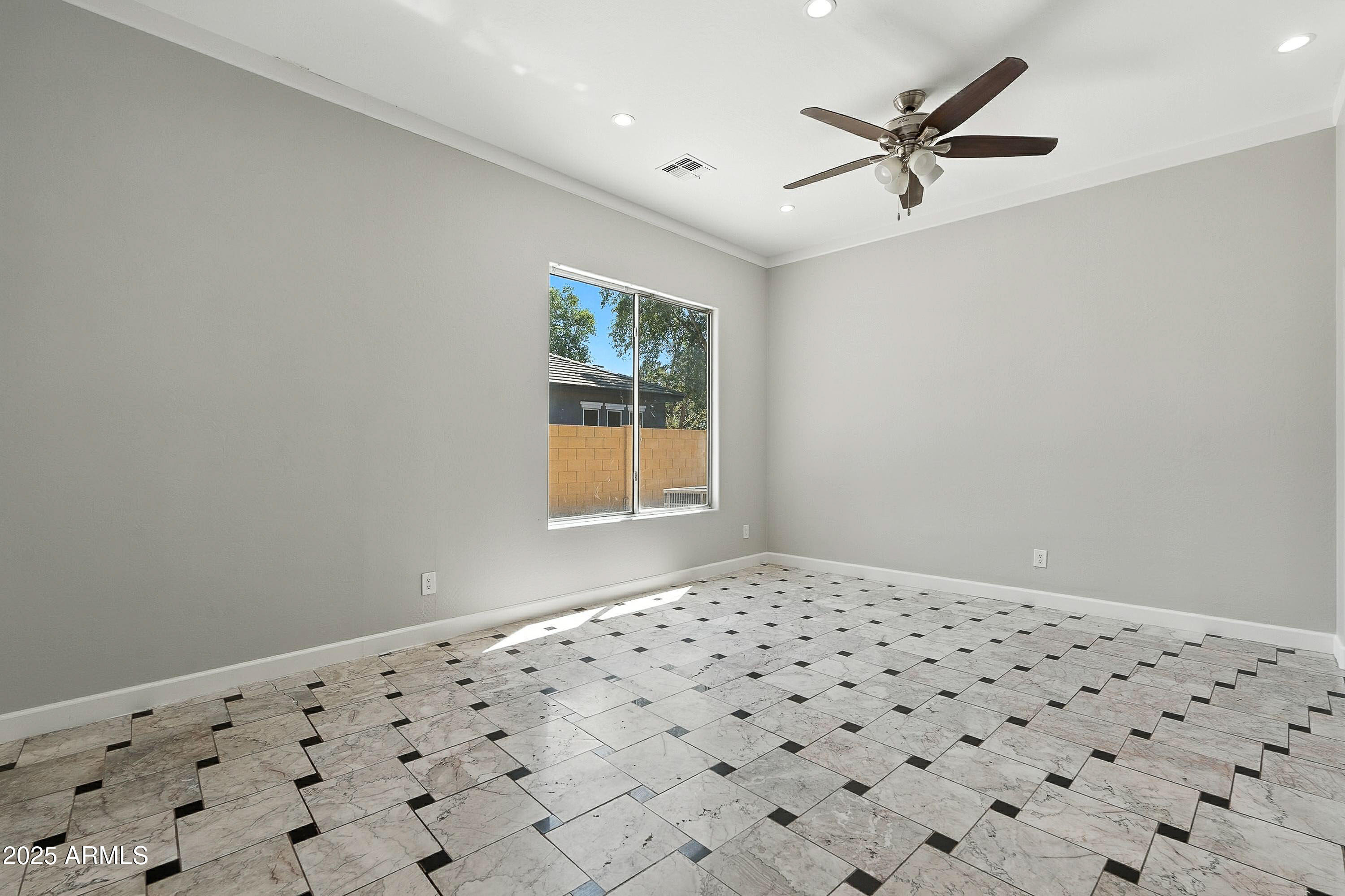 3042 South Seton Avenue Gilbert, AZ 85295 - Photo 20 of 71 a bedroom with a bed and a window