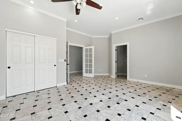 a view of an empty room and window