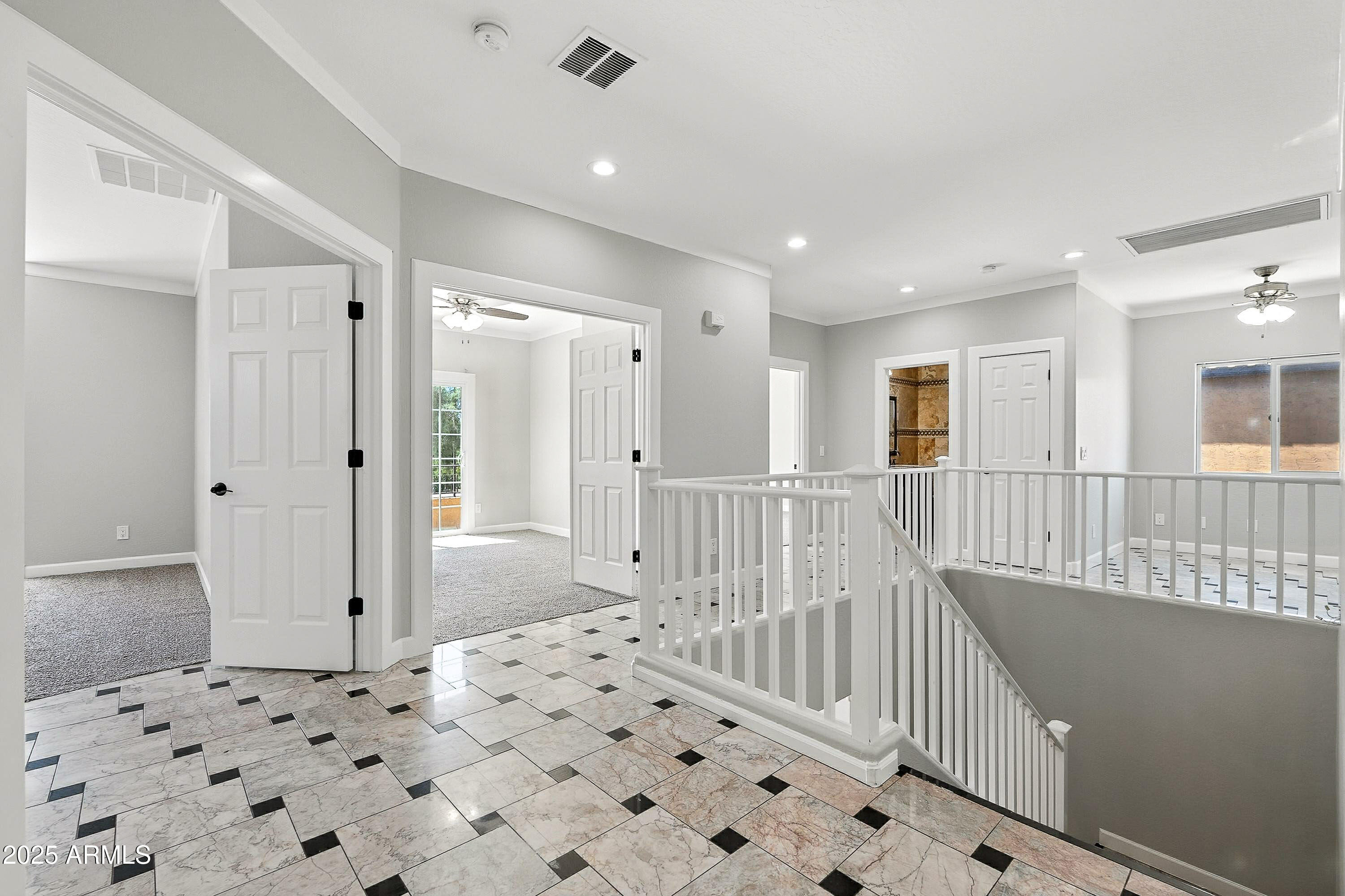 3042 South Seton Avenue Gilbert, AZ 85295 - Photo 29 of 71 a view of a hallway with wooden floor and windows