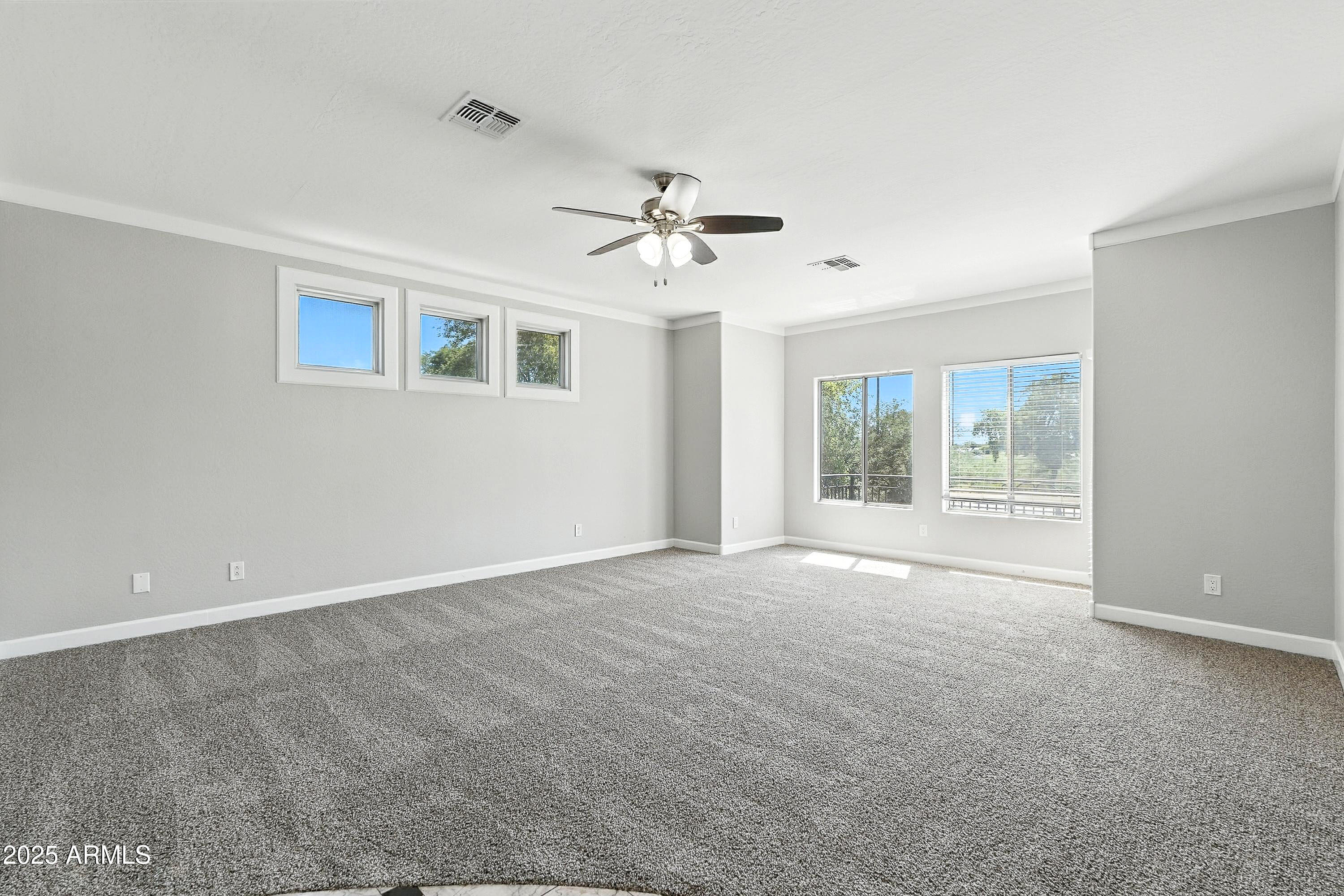 3042 South Seton Avenue Gilbert, AZ 85295 - Photo 31 of 71 a view of an empty room with a window