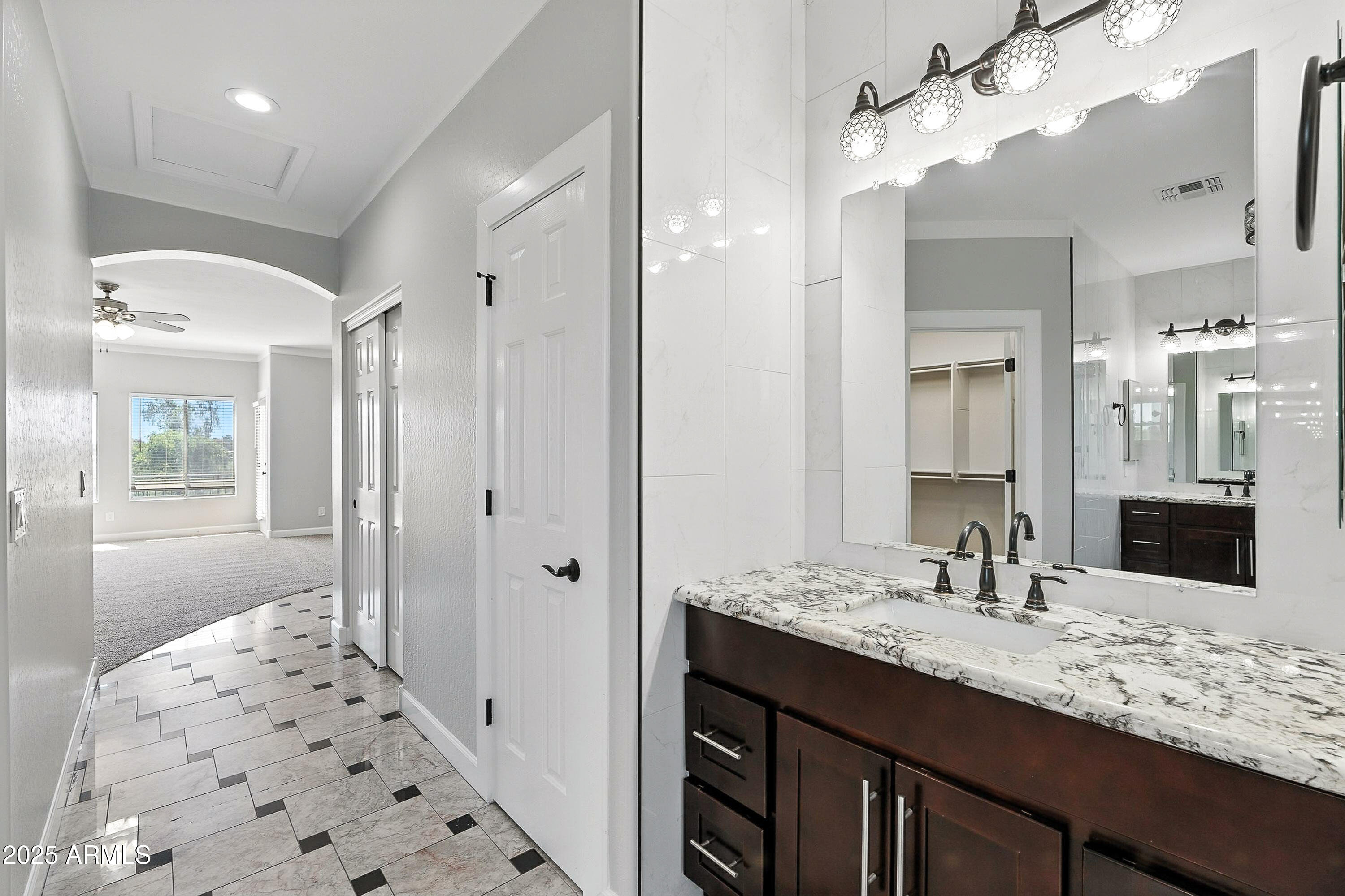 3042 South Seton Avenue Gilbert, AZ 85295 - Photo 37 of 71 a bathroom with a sink double vanity and shower
