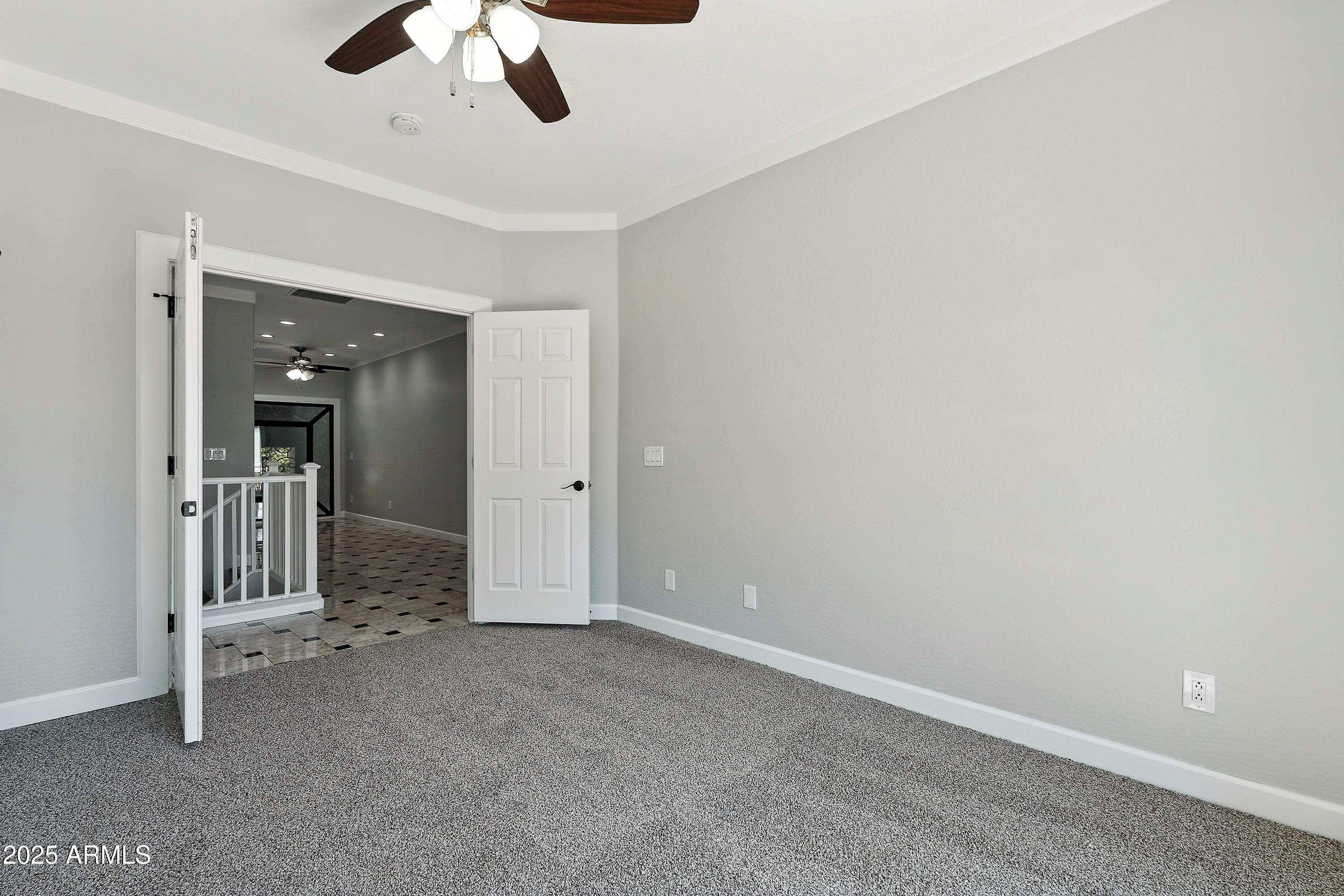 3042 South Seton Avenue Gilbert, AZ 85295 - Photo 43 of 71 en empty room with chandelier fan