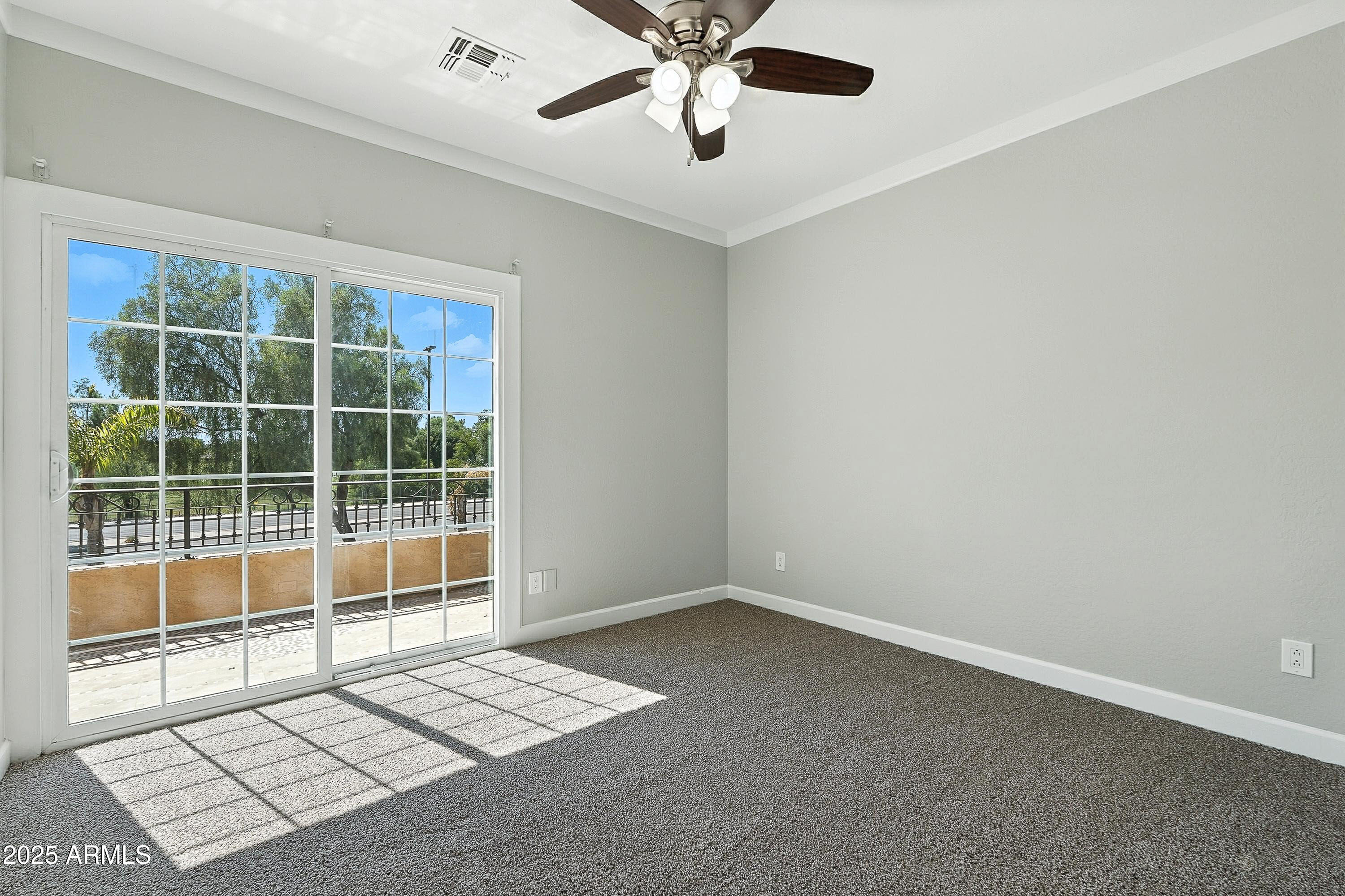 3042 South Seton Avenue Gilbert, AZ 85295 - Photo 44 of 71 a view of an empty room with a window