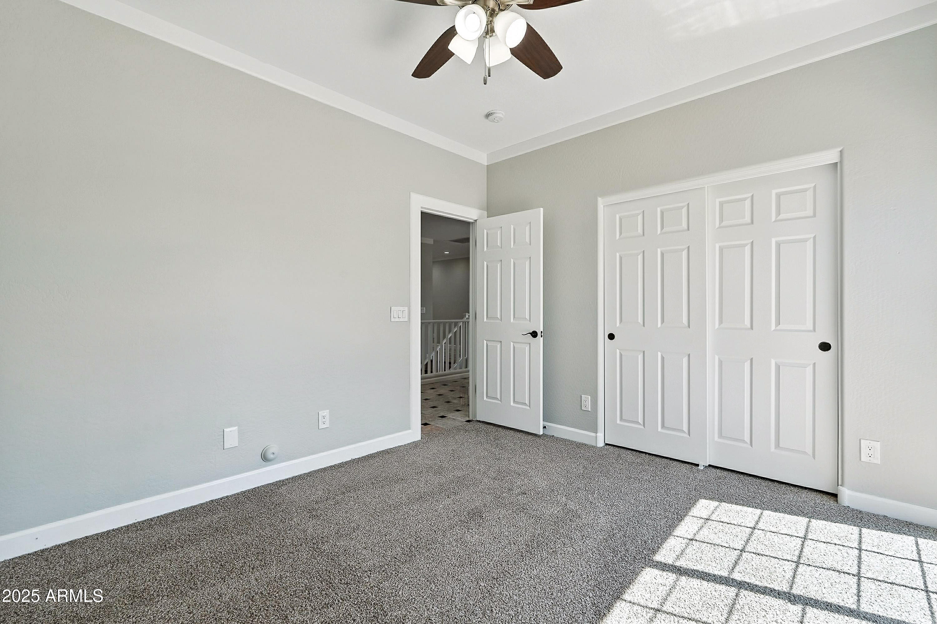 3042 South Seton Avenue Gilbert, AZ 85295 - Photo 45 of 71 a view of an empty room with chandelier fan