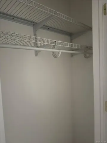 a view of a room with racks on the wall