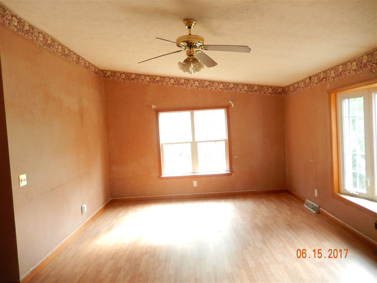 3277 Jollett Road Elkton, VA 22827 - Photo 2 of 8 wooden floor in an empty room with a window