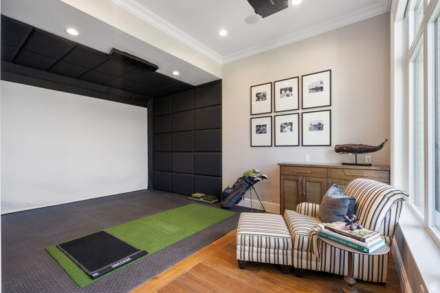 115 East Hidden Ridge Lane, Unit 42 Mapleton, UT 84664 - Photo 63 of 103 Dedicated entertainment room featuring a large projector screen, padded acoustic wall panels, and recessed lighting