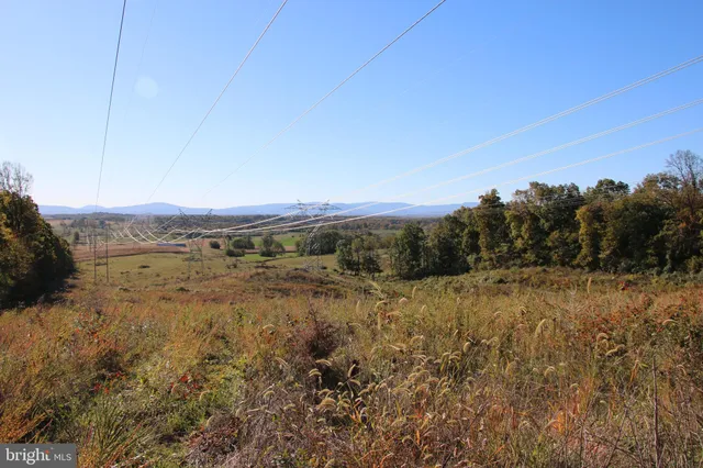 a view of mountain with lake view