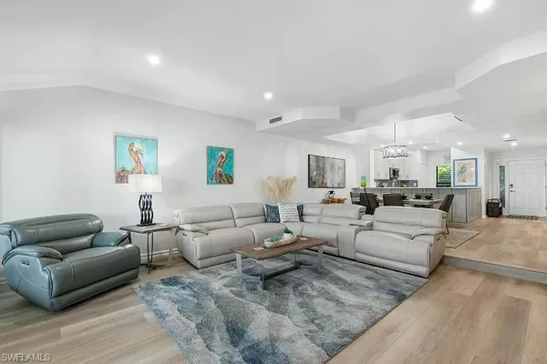 a living room with furniture and a couch