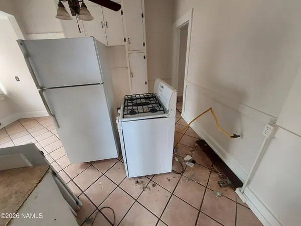 a storage room with washer and dryer