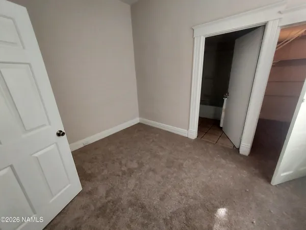 an empty room with a door