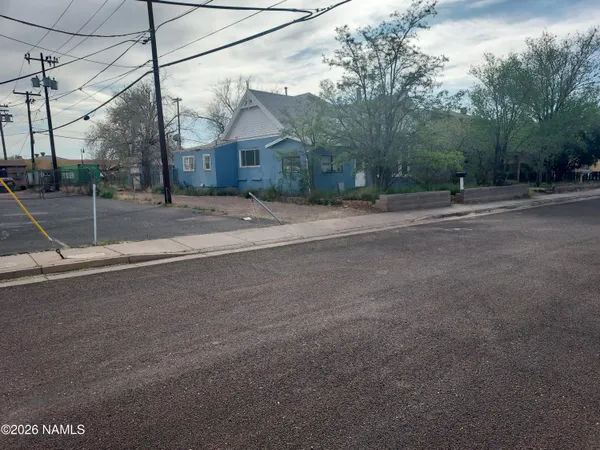 a view of a street with houses