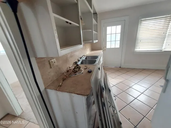 a room with furniture and a window