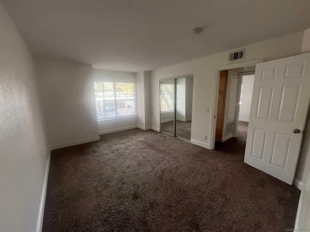 an empty room with window