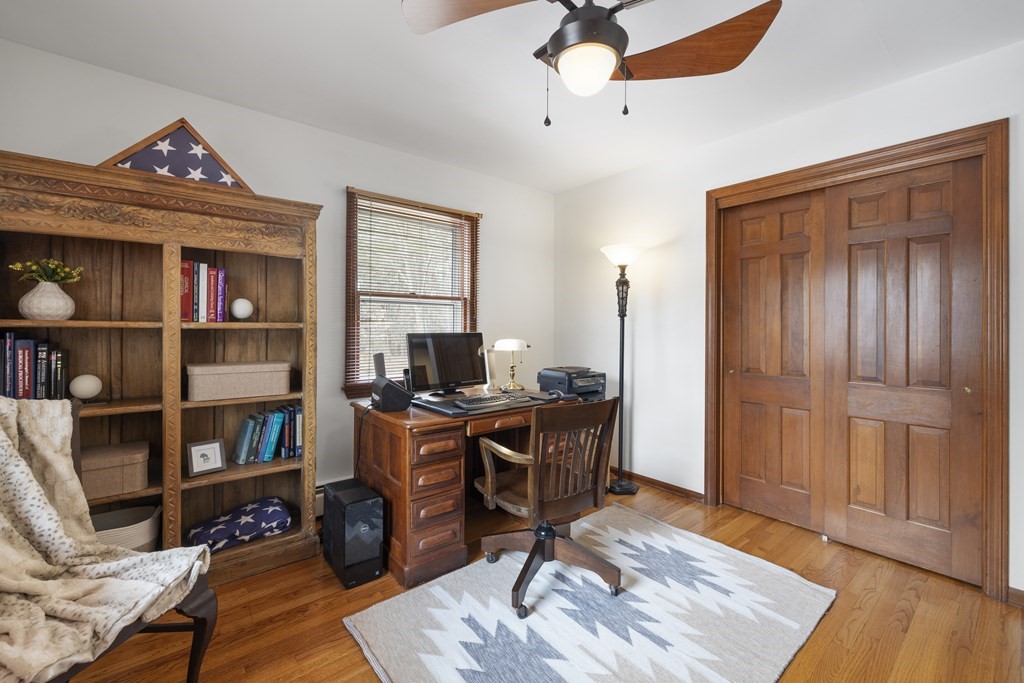 270 Middleton Road Boxford, MA 01921 - Photo 14 of 40 a view of a workspace with furniture and wooden floor