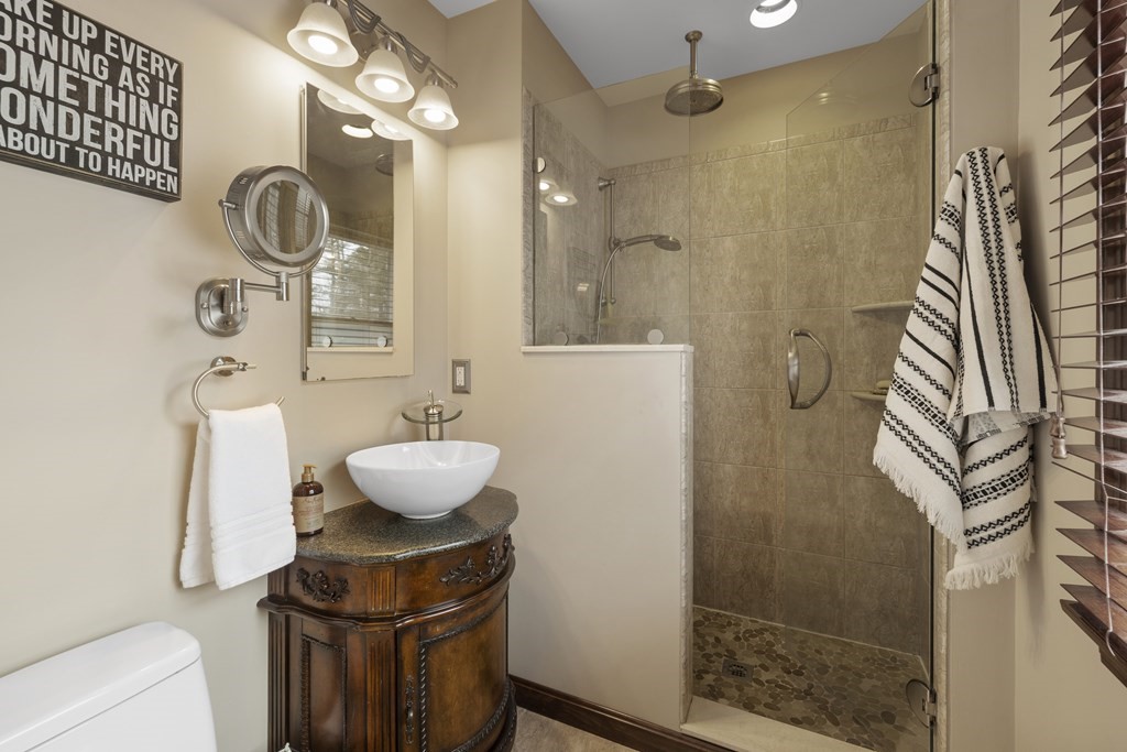 270 Middleton Road Boxford, MA 01921 - Photo 23 of 40 a bathroom with a sink and a mirror