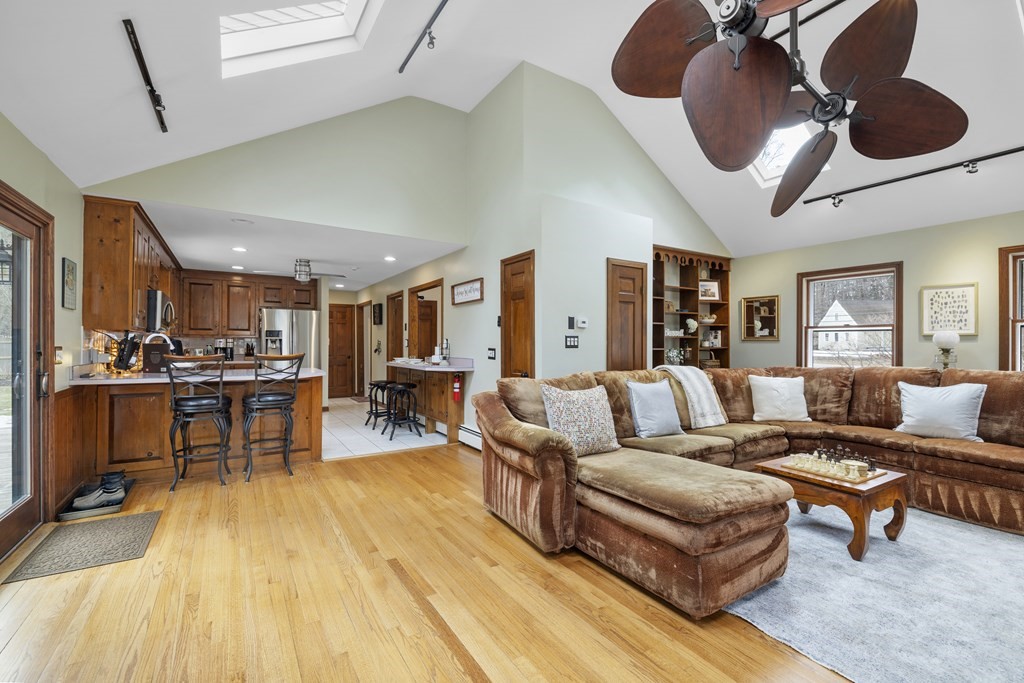 270 Middleton Road Boxford, MA 01921 - Photo 28 of 40 a living room with furniture and kitchen view