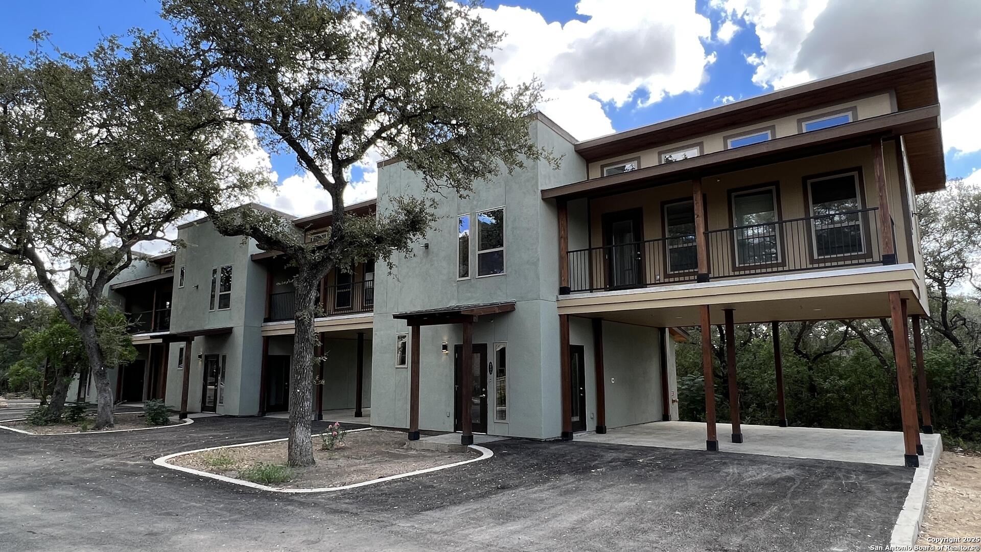 a view of a building with a porch