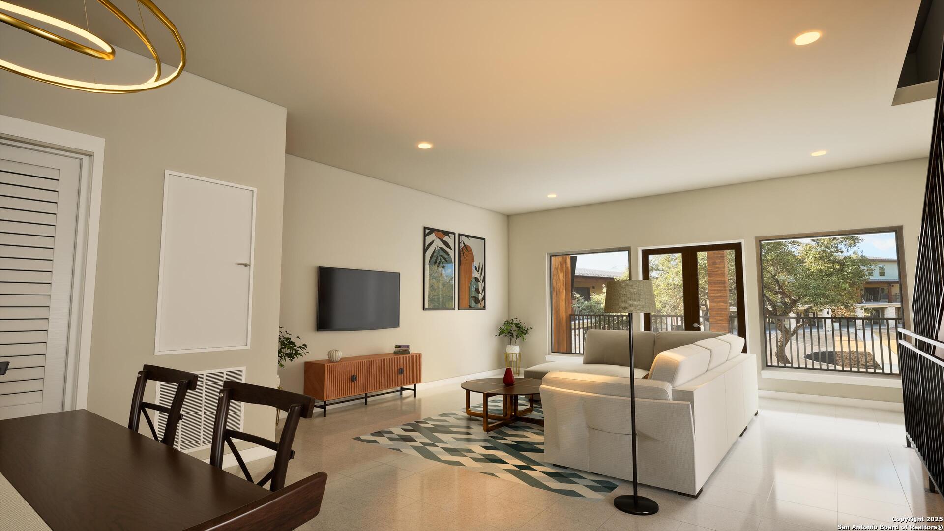 14743 Old Bandera Road, Unit 4 Helotes, TX 78023 - Photo 3 of 7 a living room with furniture and a flat screen tv