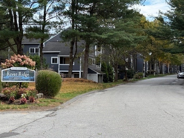 500 Colonial Drive, Unit 3 Ipswich, MA 01938 - Photo 13 of 23 front view of a house with a yard