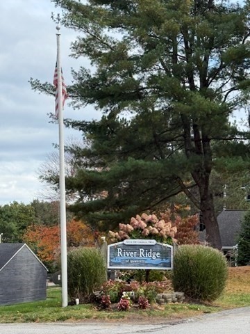 500 Colonial Drive, Unit 3 Ipswich, MA 01938 - Photo 14 of 23 a view of a street with sign board