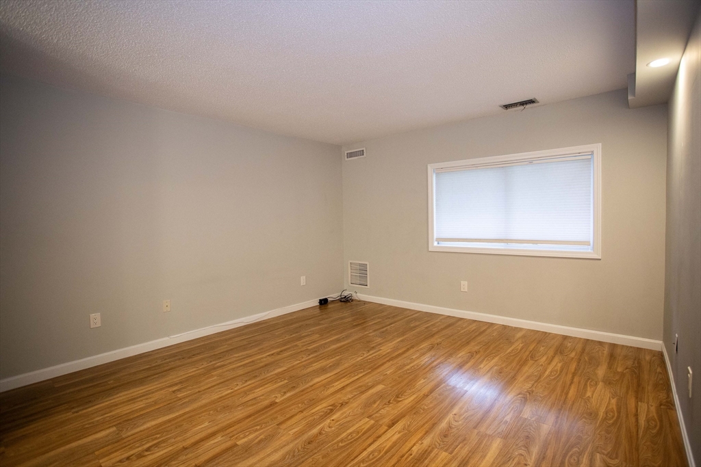 500 Colonial Drive, Unit 3 Ipswich, MA 01938 - Photo 6 of 23 wooden floor in a room