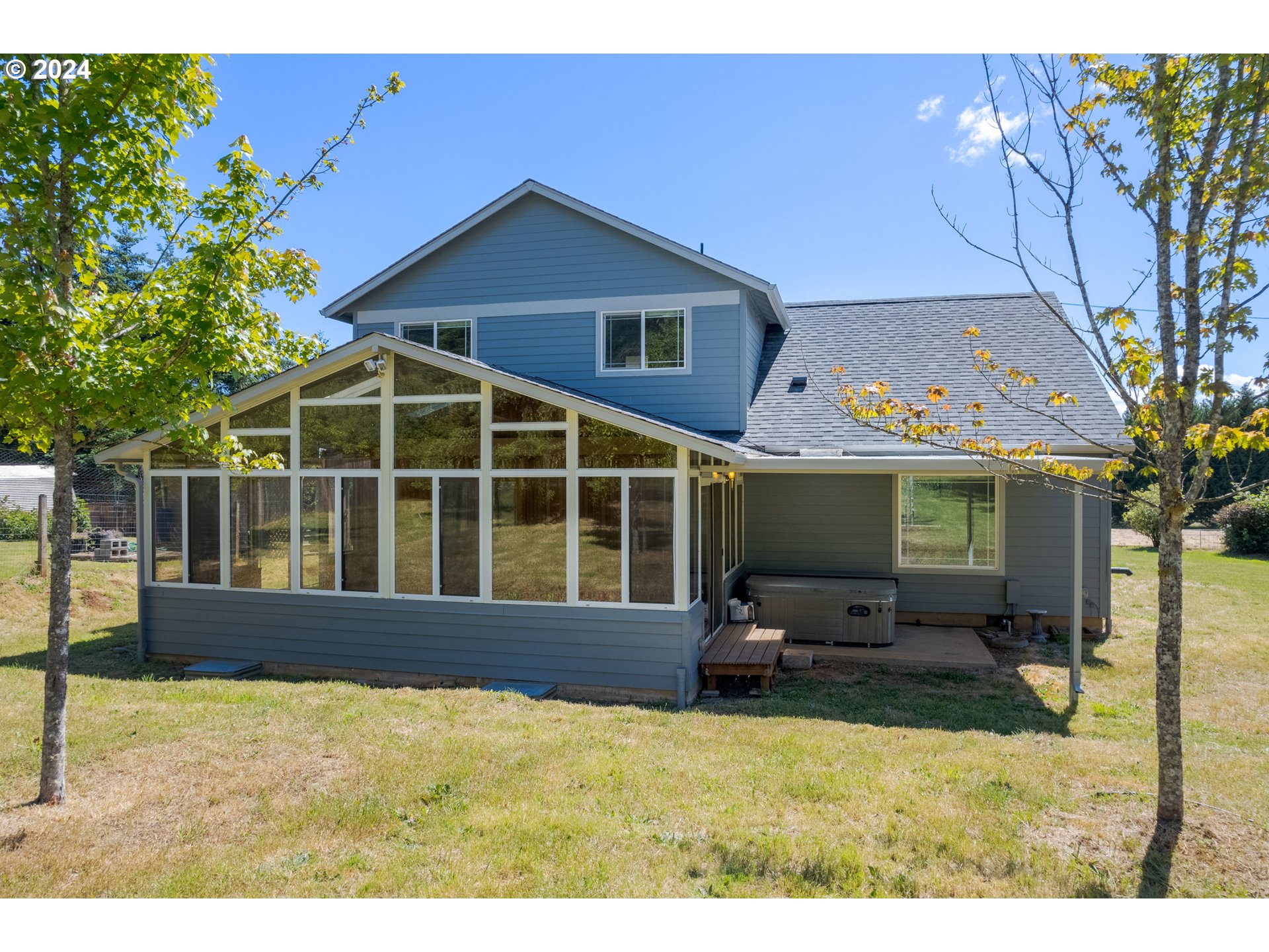 89584 Demming Road Elmira, OR 97437 - Photo 27 of 32 a front view of a house with a yard