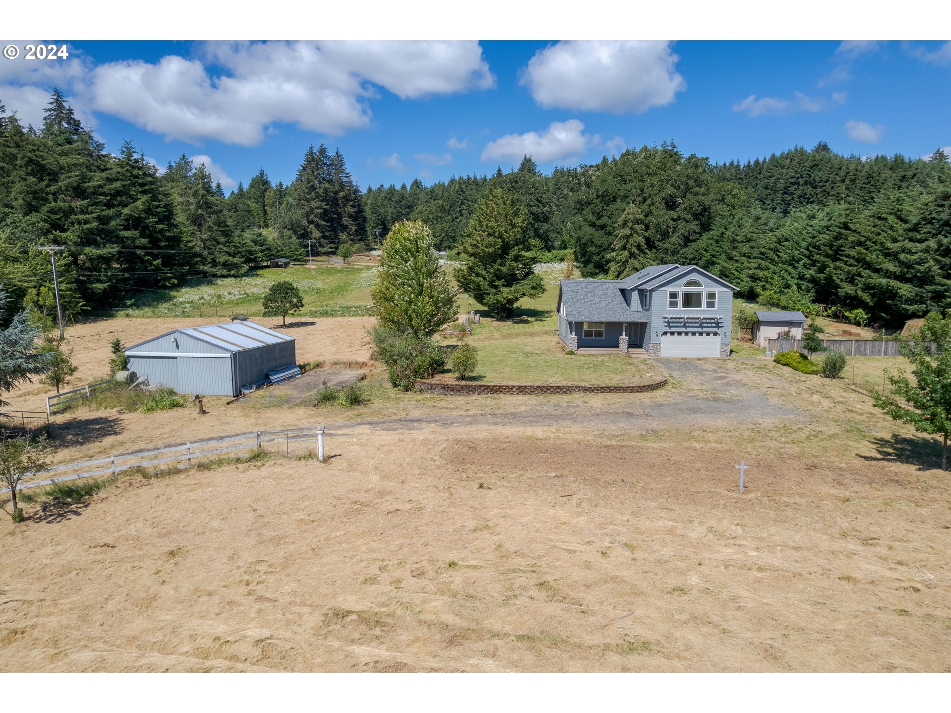 89584 Demming Road Elmira, OR 97437 - Photo 30 of 32 a view of a yard with a house