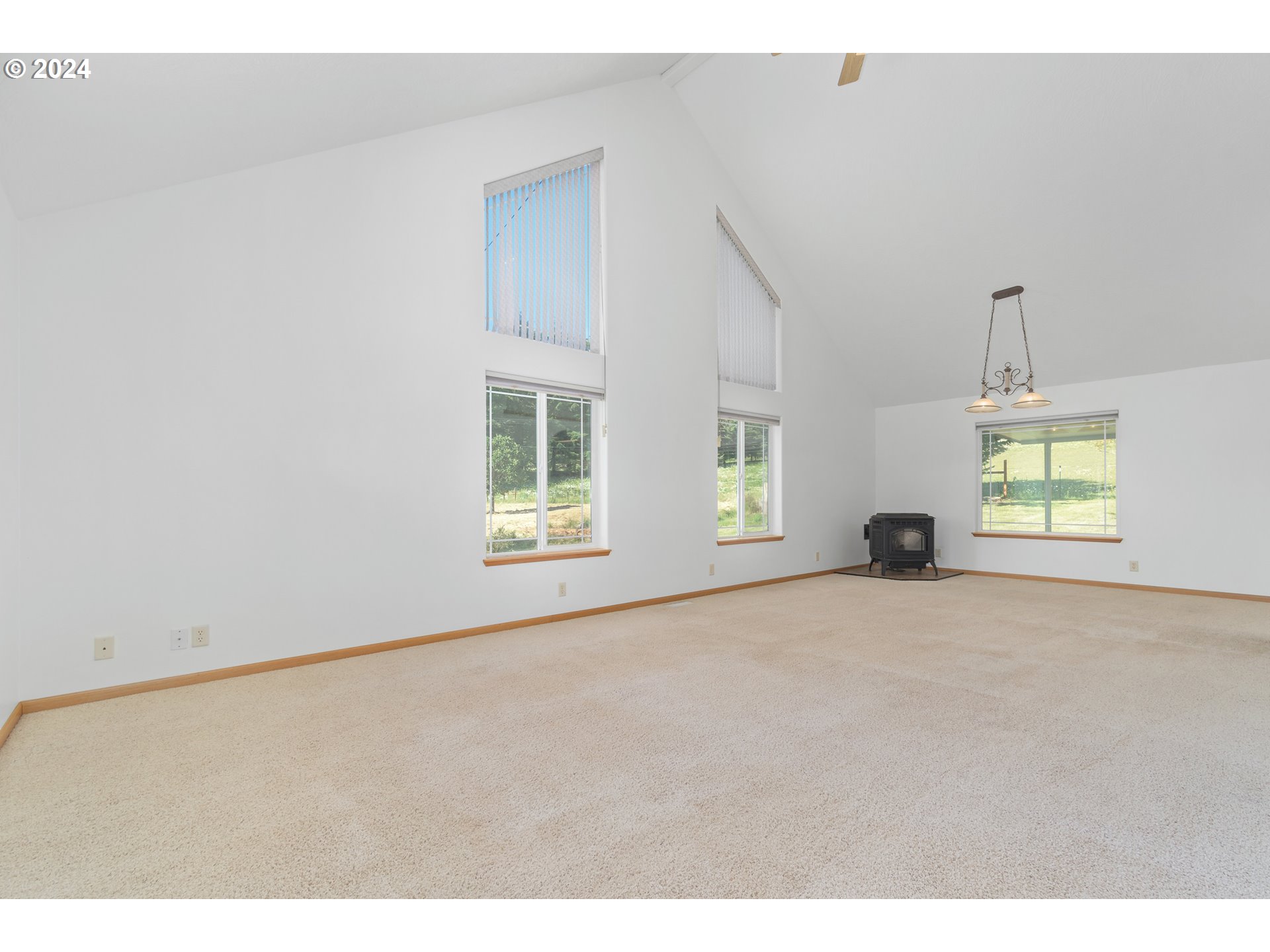 89584 Demming Road Elmira, OR 97437 - Photo 4 of 32 a view of an empty room with a window
