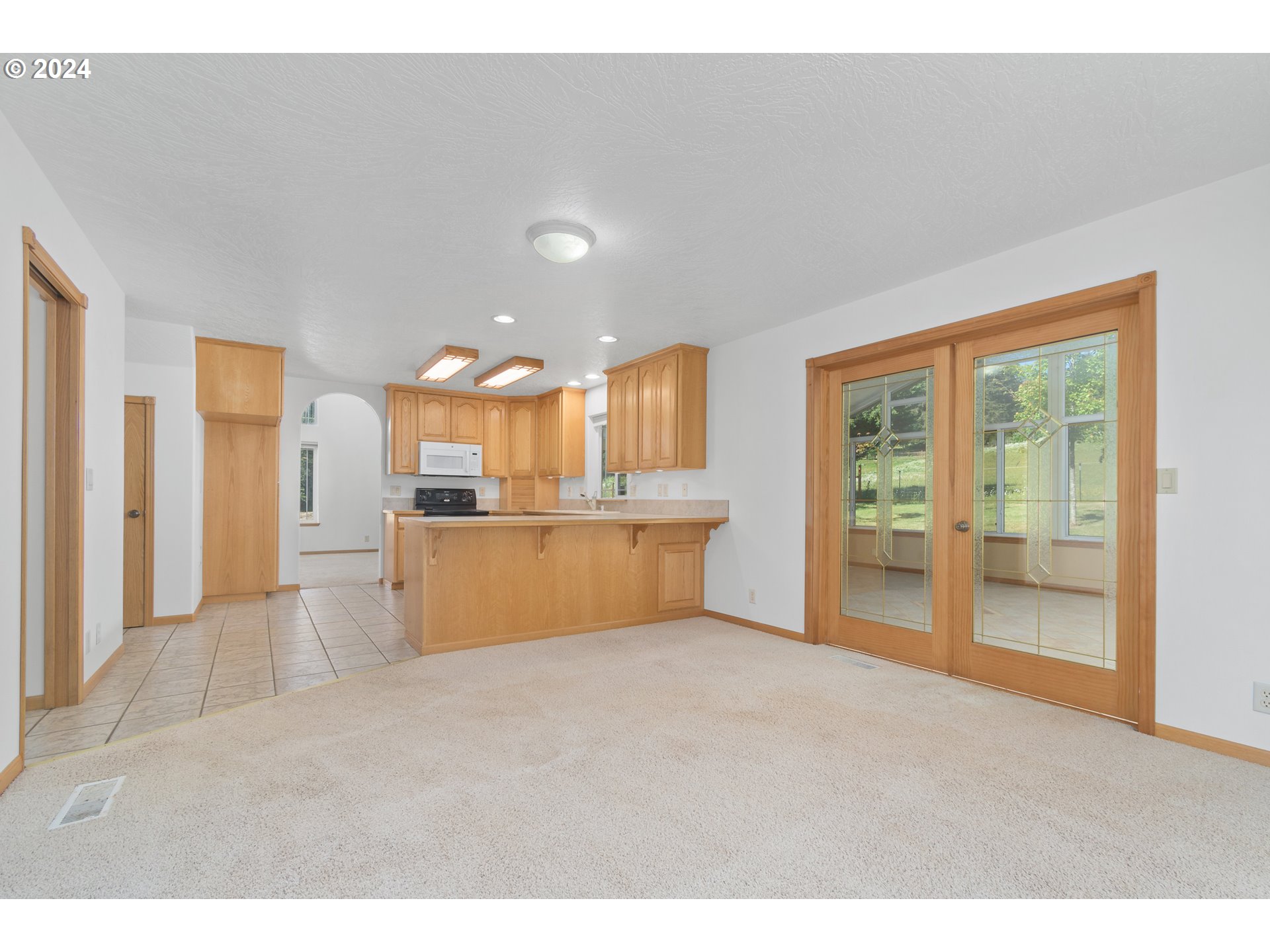 89584 Demming Road Elmira, OR 97437 - Photo 10 of 32 a view of a kitchen with a sink