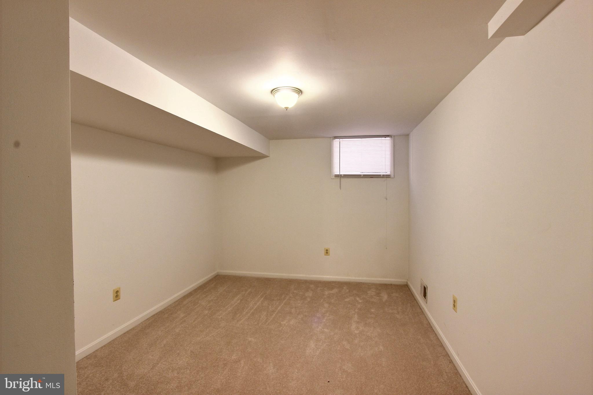 33 Stonegate Drive Silver Spring, MD 20905 - Photo 40 of 42 Lower level guest bedroom