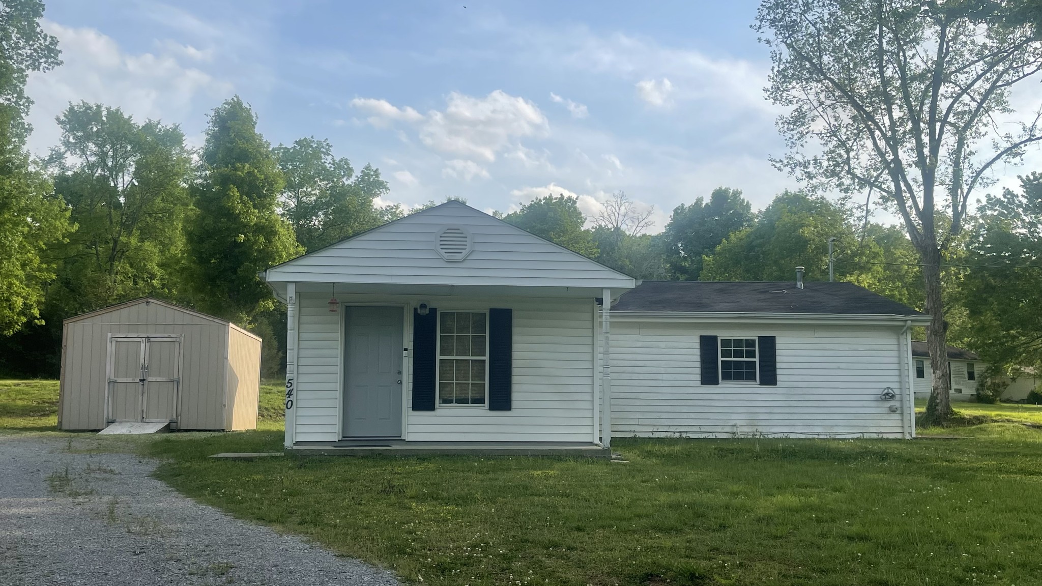 540 Canoe Branch Road Lebanon, TN 37087 - Photo 1 of 17 a front view of a house with a garden