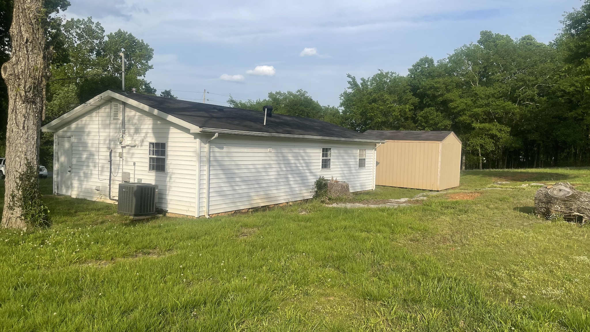 540 Canoe Branch Road Lebanon, TN 37087 - Photo 11 of 17 a view of a house with backyard and garden