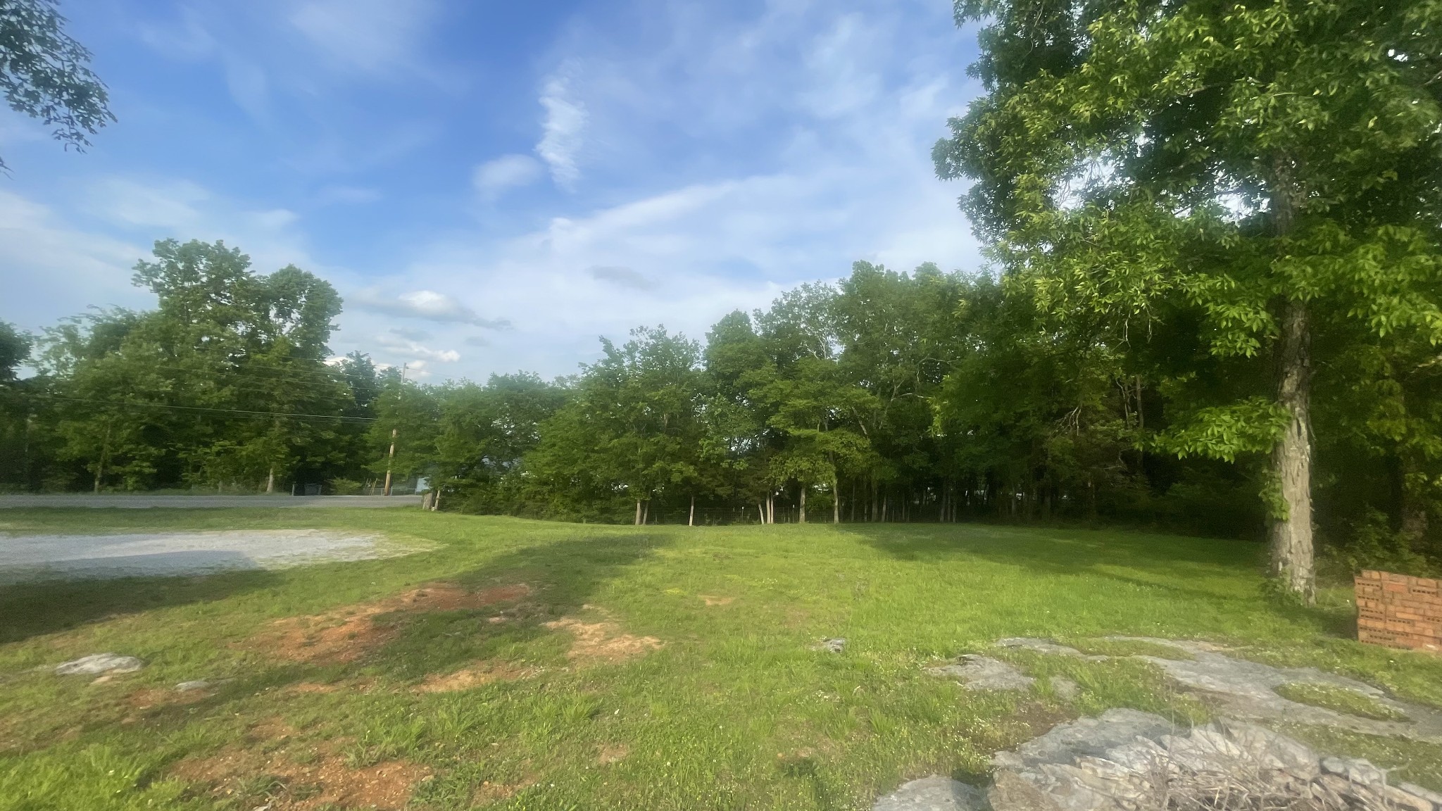 540 Canoe Branch Road Lebanon, TN 37087 - Photo 14 of 17 a view of a field with trees in the background