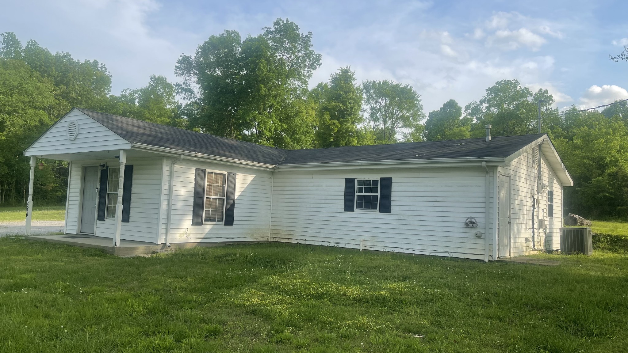 540 Canoe Branch Road Lebanon, TN 37087 - Photo 10 of 17 a front view of a house with a garden