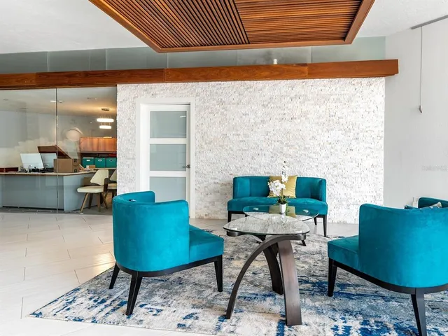 a workspace with furniture and a rug